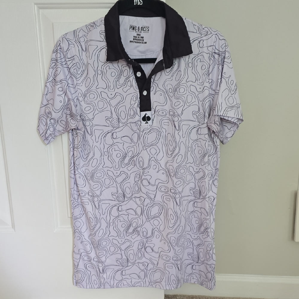 White and Black Polo Shirt with Abstract Design